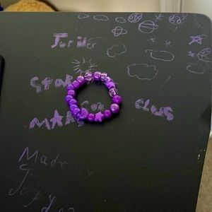 Purple bracelet 7$ made by 9 yr old